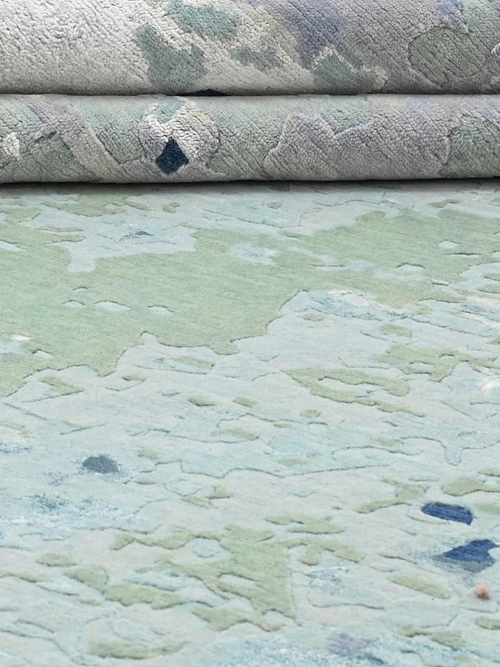Detail view of Abstract Blue Grey Bhadohi Wool & Bamboo Silk Hand Knotted Rug highlighting the intricate pattern and pile texture, in an alternate...