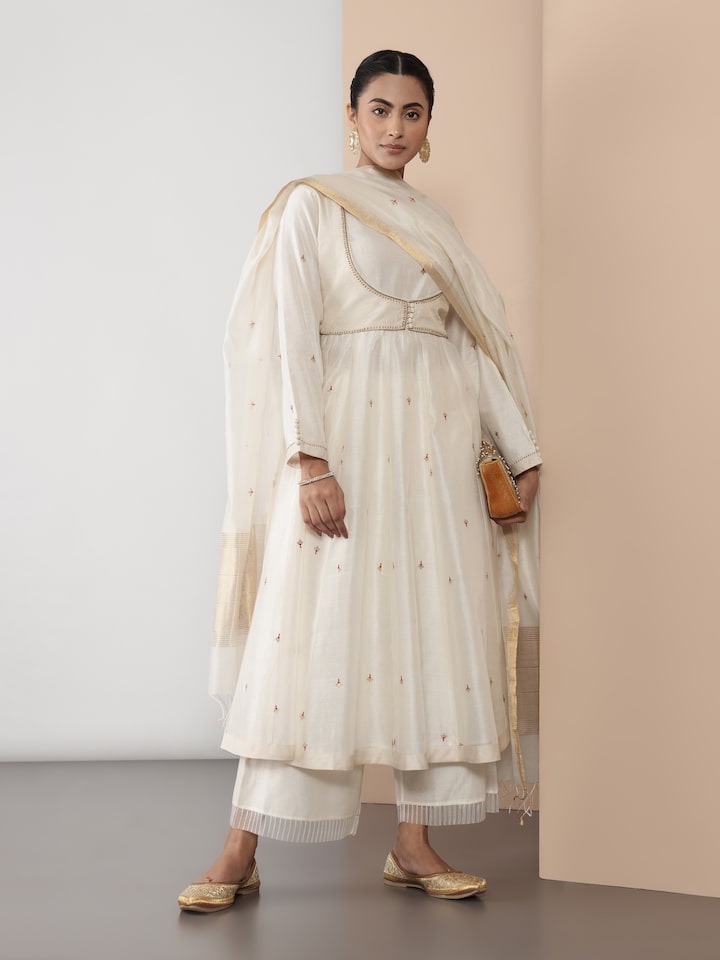 Angled view of cotton silk Chanderi Anarkali kurta highlighting fabric texture and embroidery details.