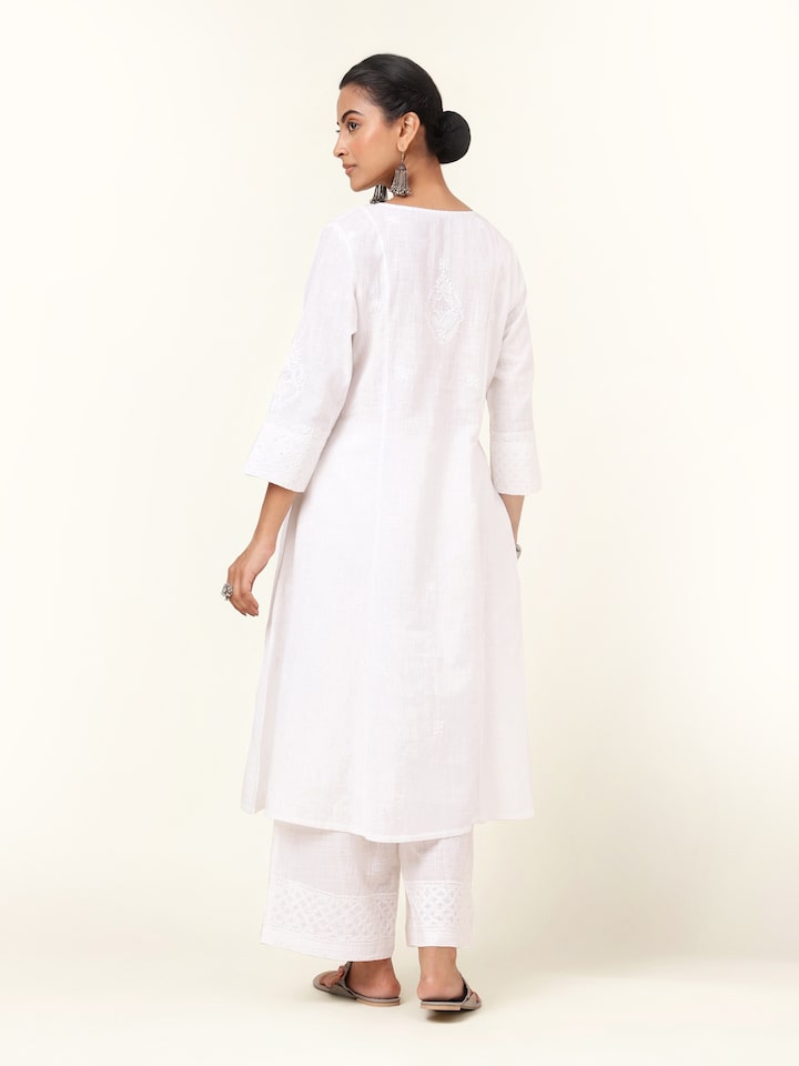 Back view of white cotton Chikankari kurta showing the clean finish and straight back hem.