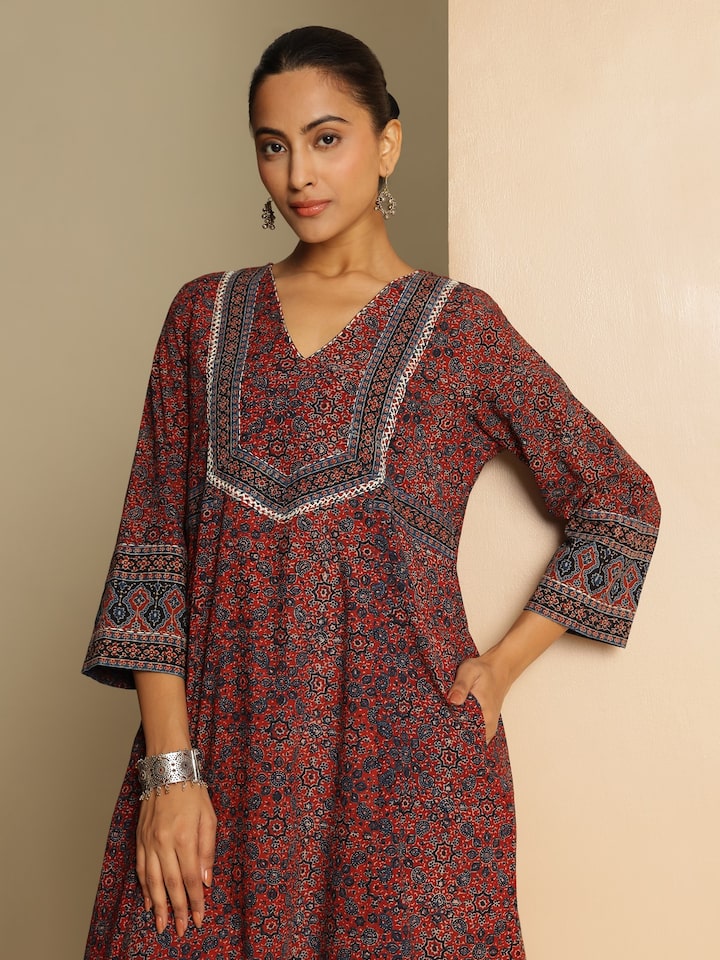 Second lifestyle view of blue Ajrakh A-line kurta styled with leggings and earrings