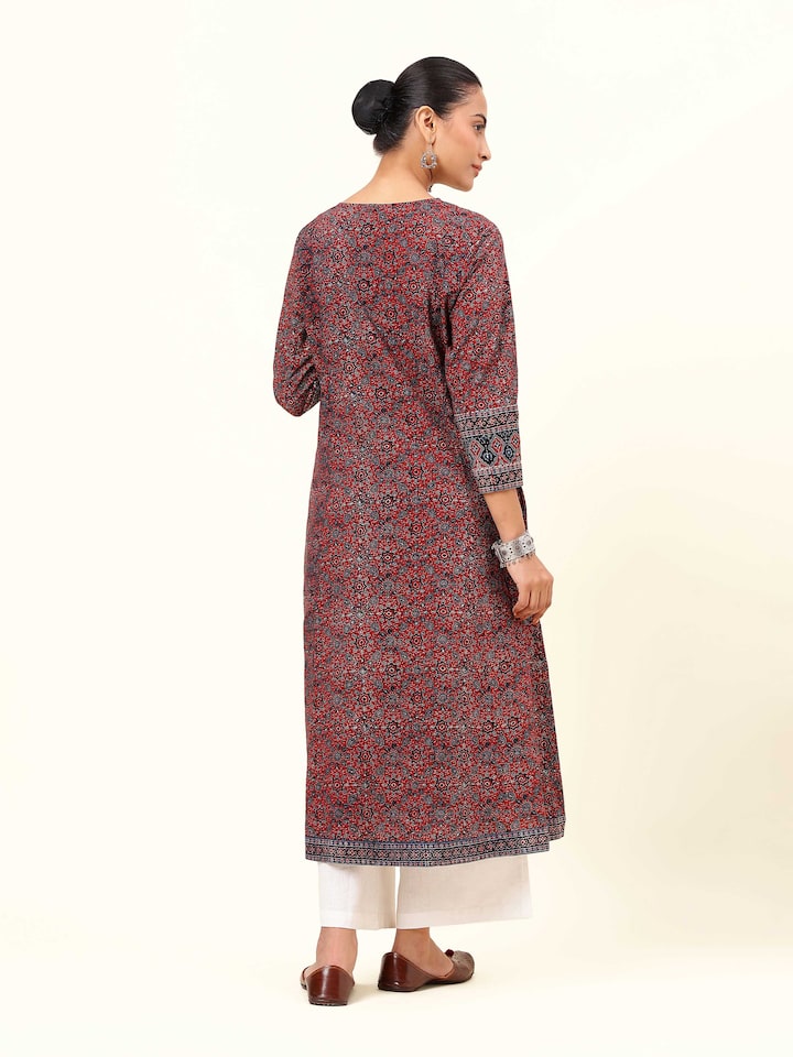 Back view of Ajrakh block printed blue A-line kurta highlighting back pattern and fall