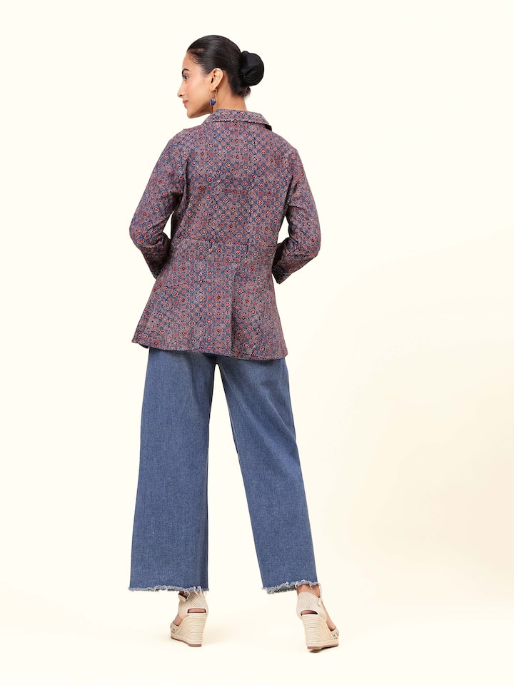 Back view of blue Ajrakh block printed top with keyhole button detail