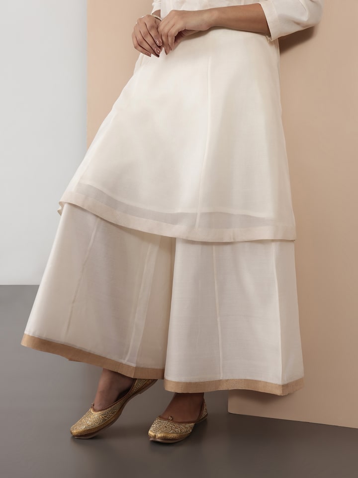Another angle highlighting fabric transparency and embroidery accents.