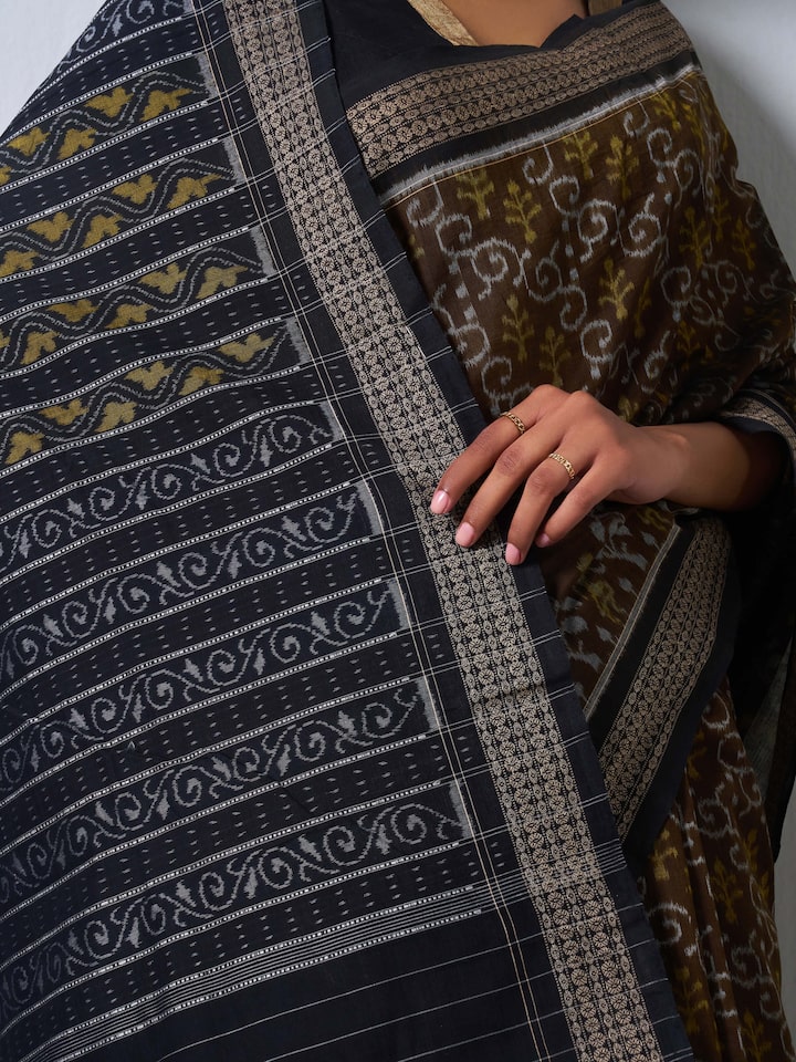 Detail shot of Brown Cotton Bandha Odisha Ikat Saree focusing on Bandha Ikat motifs