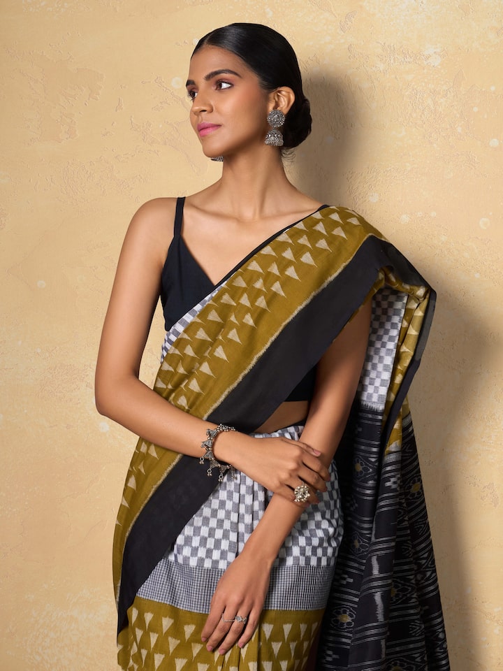 Angled view focusing on cotton texture and distinct bandha ikat designs