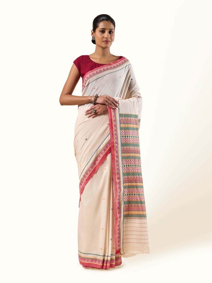 Front view of Off-white Cotton Dongaria Saree showing subtle off-white cotton with handwoven texture