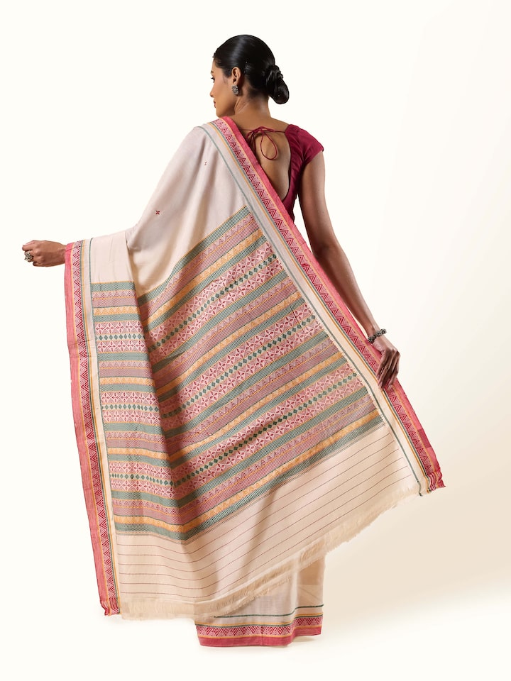 Back view of Off-white Cotton Dongaria Saree showing the full length and woven details