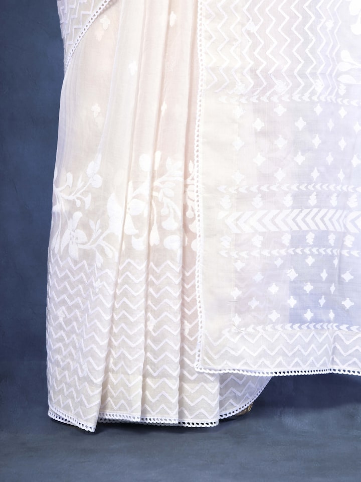 Another angle showcasing the soft drape and understated luxury of this elegant piece.