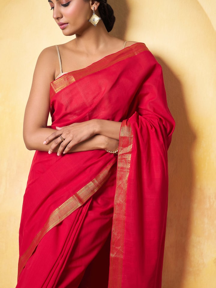 Detail shot capturing the fine weave and shimmer of Mangalgiri fabric