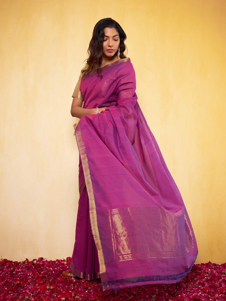Lifestyle view of purple Mangalgiri saree styled in ethnic ensemble