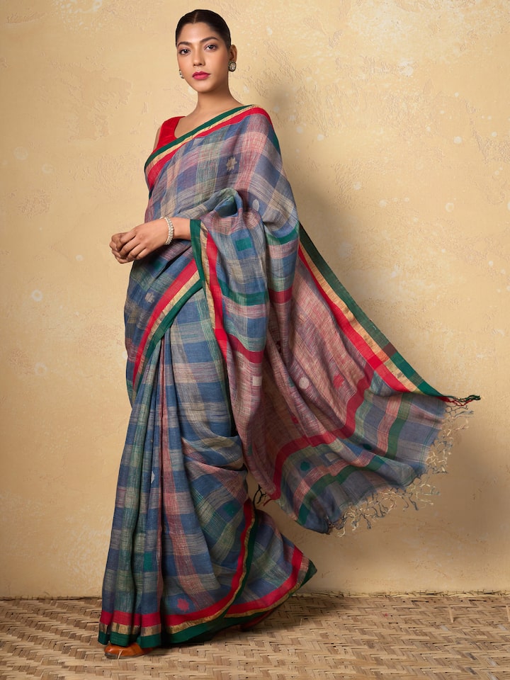 Side view of Green Linen Cotton Saree highlighting soft fabric texture and natural fall.