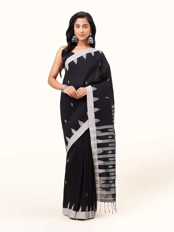 Front view of the refined black linen cotton saree, showcasing its simple elegance and rich texture.