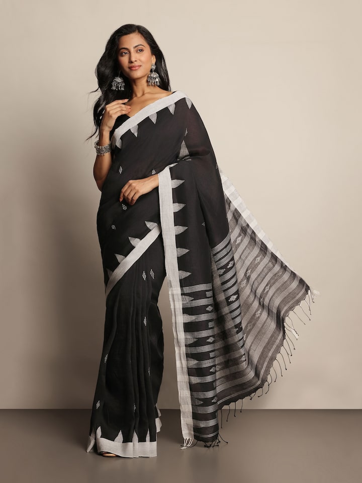 Lifestyle shot capturing the effortless drape and versatile styling.