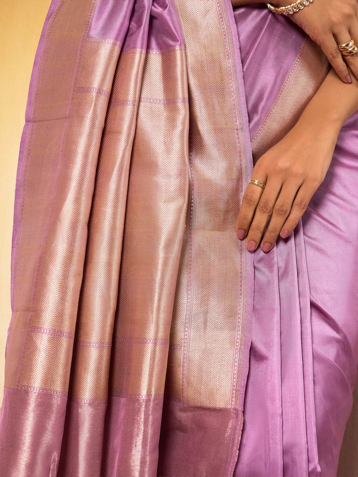 Draped image showing traditional design and elegant pallu.