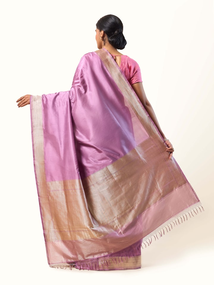 Back view focusing on fine border details and woven pattern.