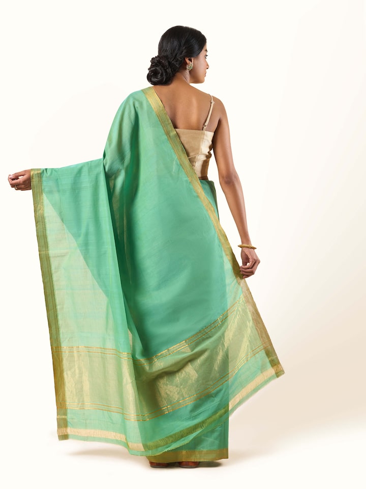 Back view revealing the balanced blend of traditional design and modern appeal.