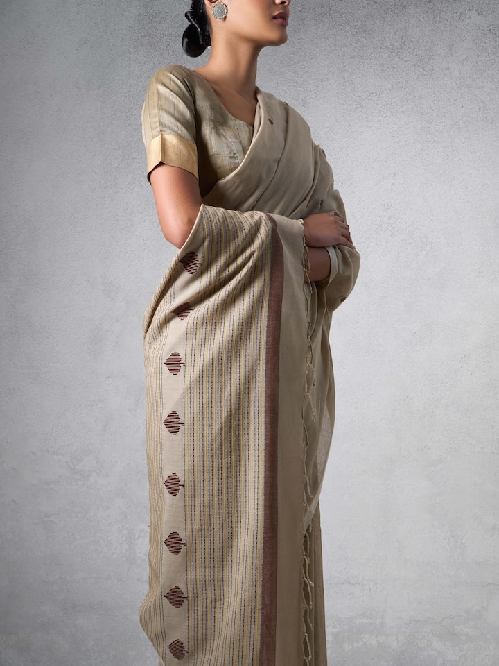Detailed shot focusing on the weave and pattern intricacies of Cotton Extra-Weft Saree