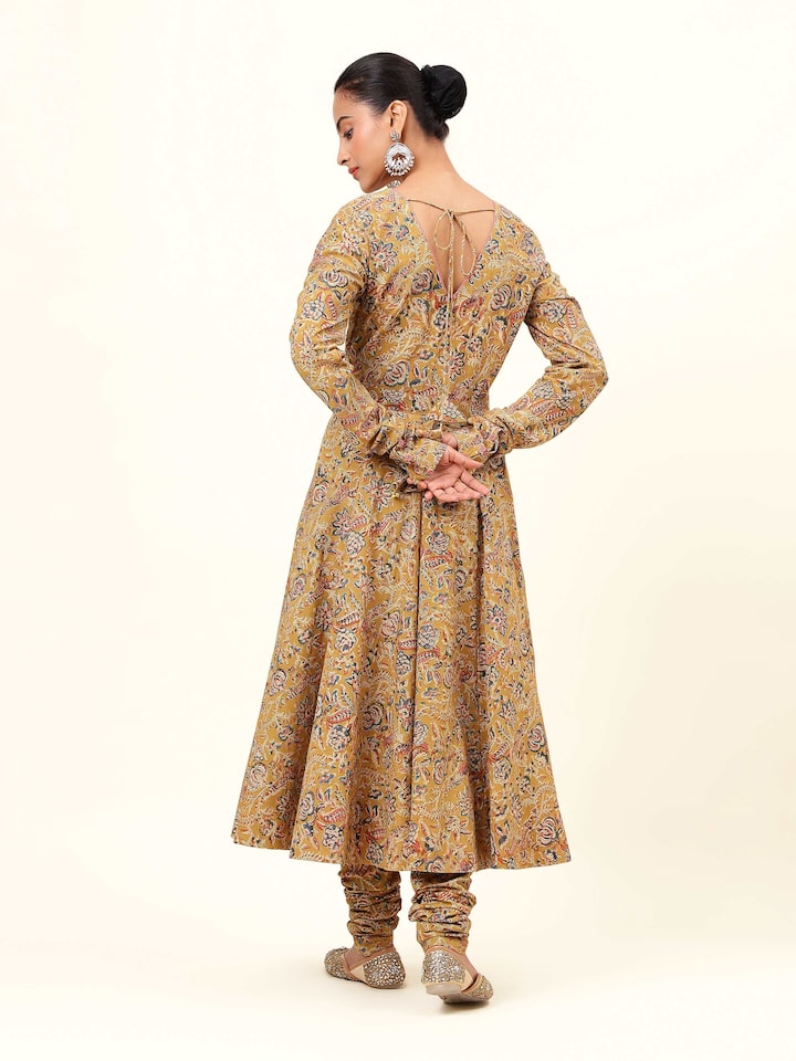 Back view of Yellow Kalamkari Block Printed Kurta on model with clear view of all-over design.