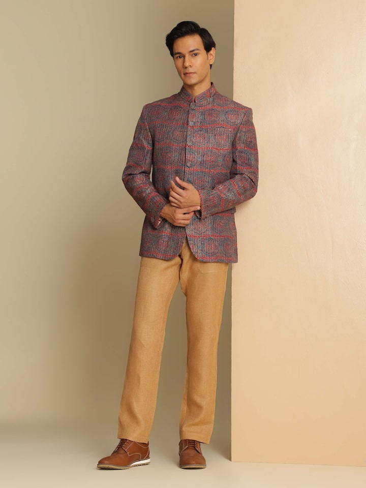 Alternate lifestyle view of indigo silk Ajrakh Bandhgala jacket showing front fit and rich print