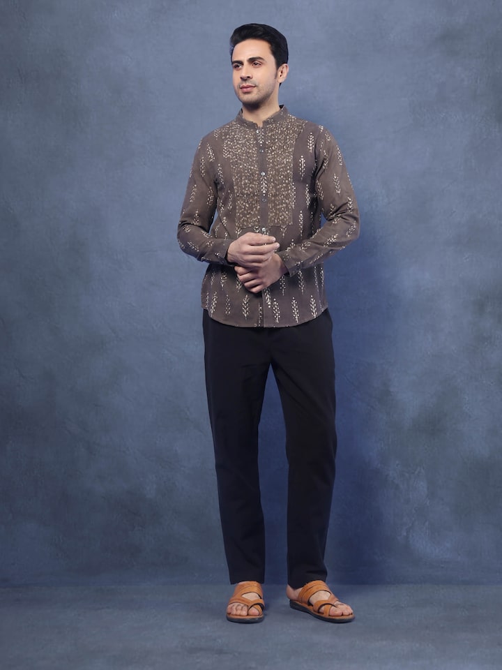 Lifestyle view of Grey Cotton Dabu Block Printed Kurta styled with casual bottoms.