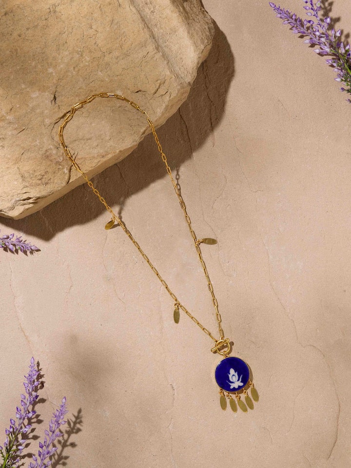 Close-up of Blue Pottery Long Necklace showing the intricate bead design and vibrant blue colors.