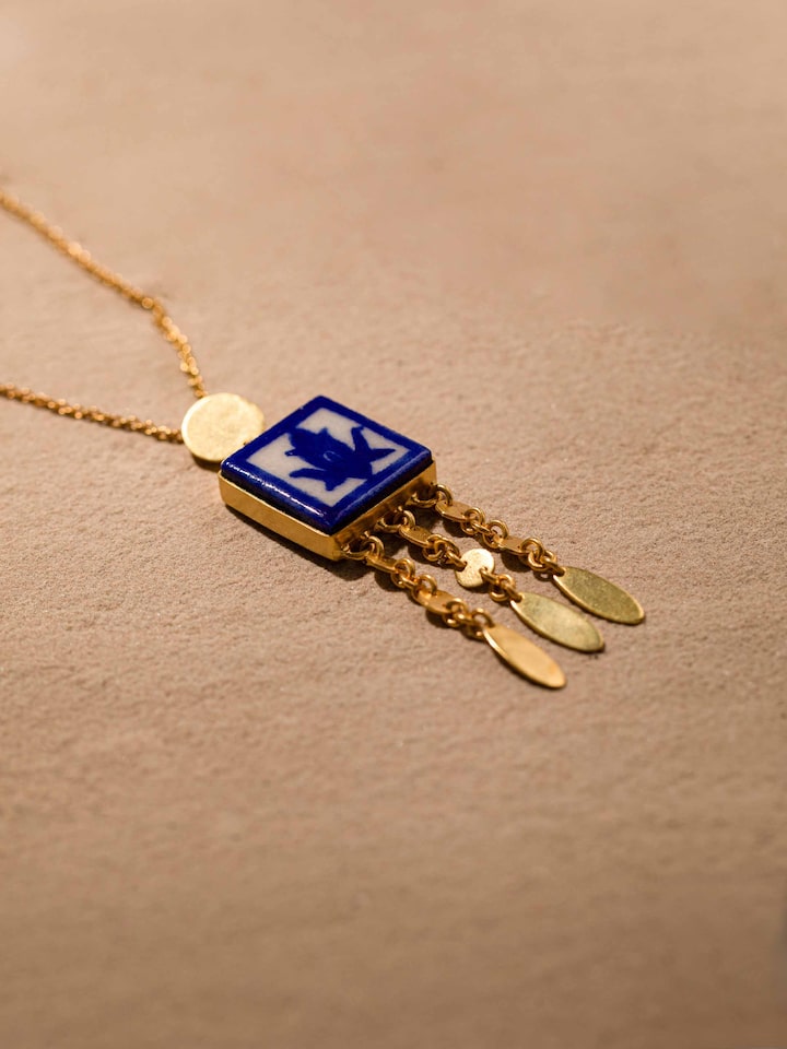 Back view of blue pottery pendant & chain highlighting the clasp and chain design.