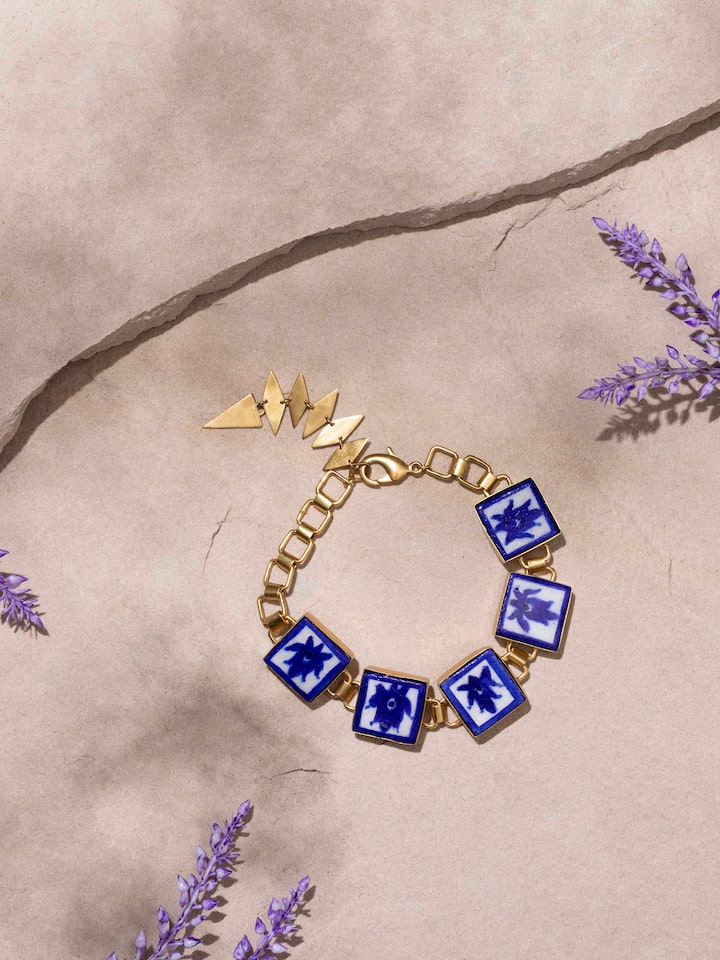 Side view of Blue Pottery Flexible Bracelet showcasing flexible design and ceramic details.