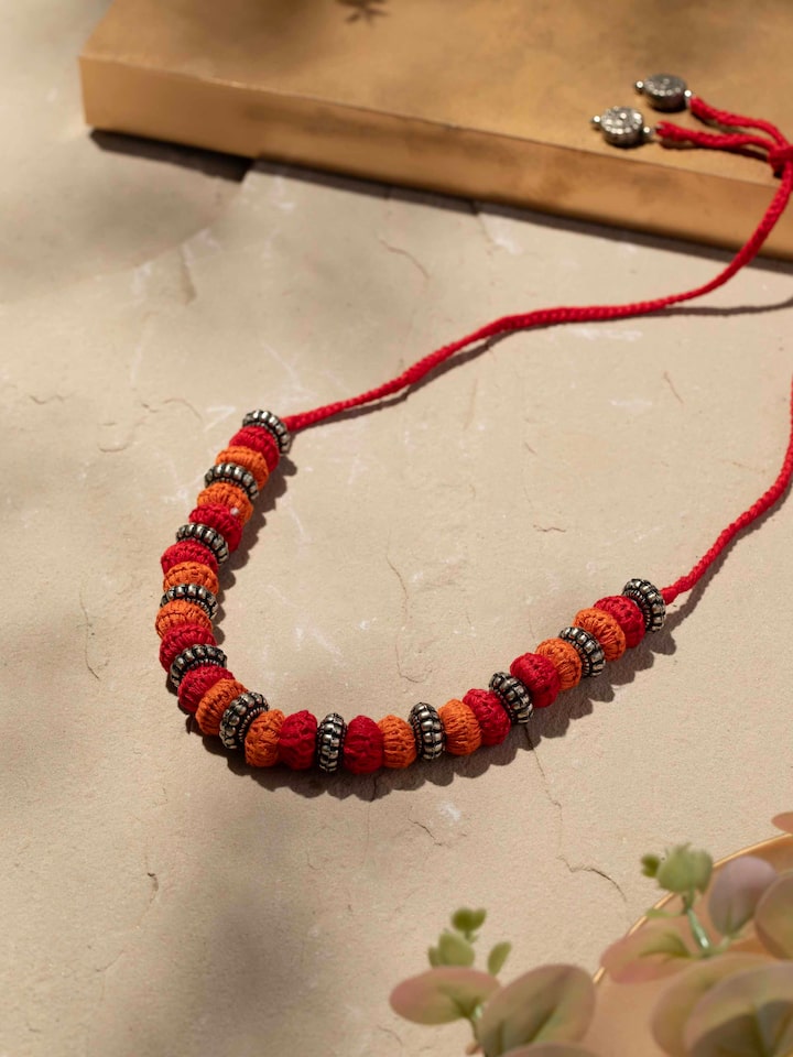 Side view of Lambani collar necklace showcasing the detailed beadwork and craftsmanship.