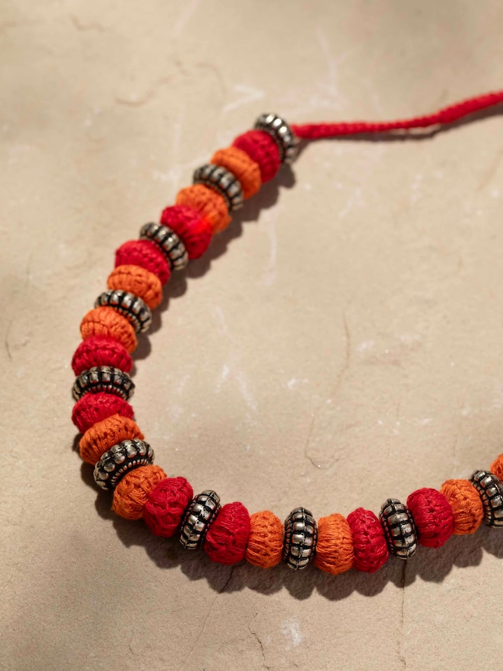 Back view of Lambani collar necklace showing the secure clasp and detailed design.
