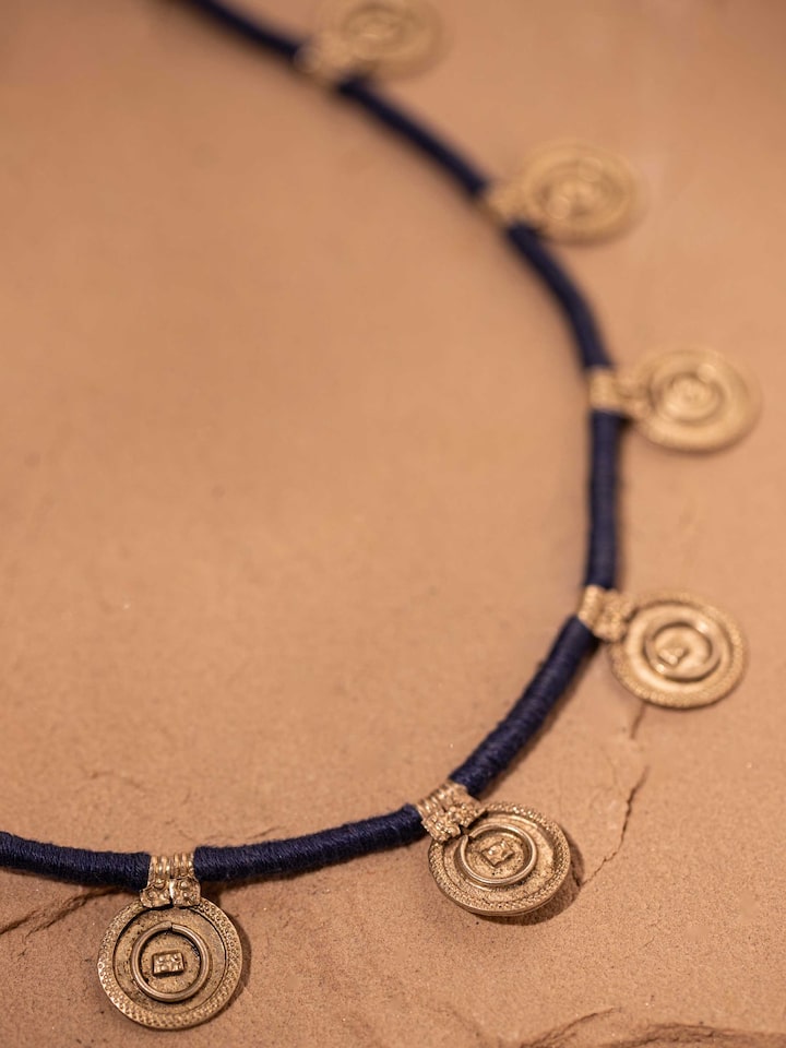 Detailed close-up of Lambani long necklace showcasing intricate details and craftsmanship