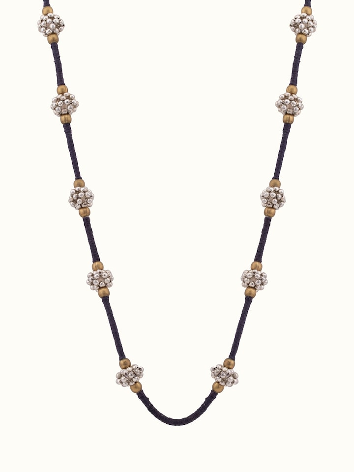 Front view of Lambani long necklace showcasing intricate traditional designs and vibrant colors.