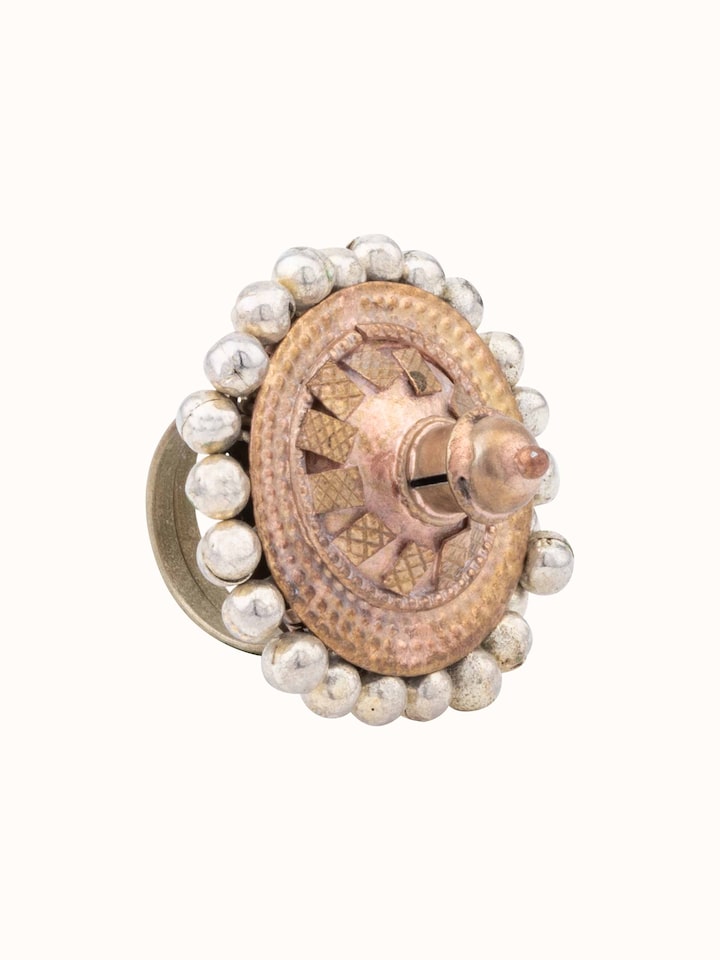 Overhead view of Lambani Ring highlighting the traditional design and detailed metalwork.
