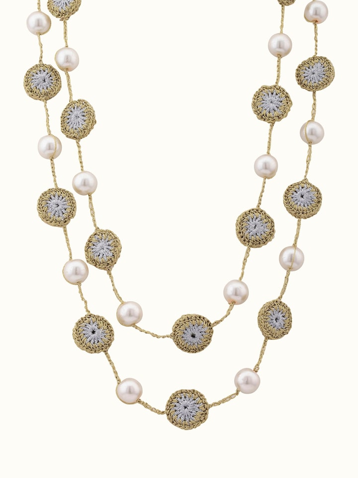 Front view of crochet long necklace showcasing its intricate crochet design.