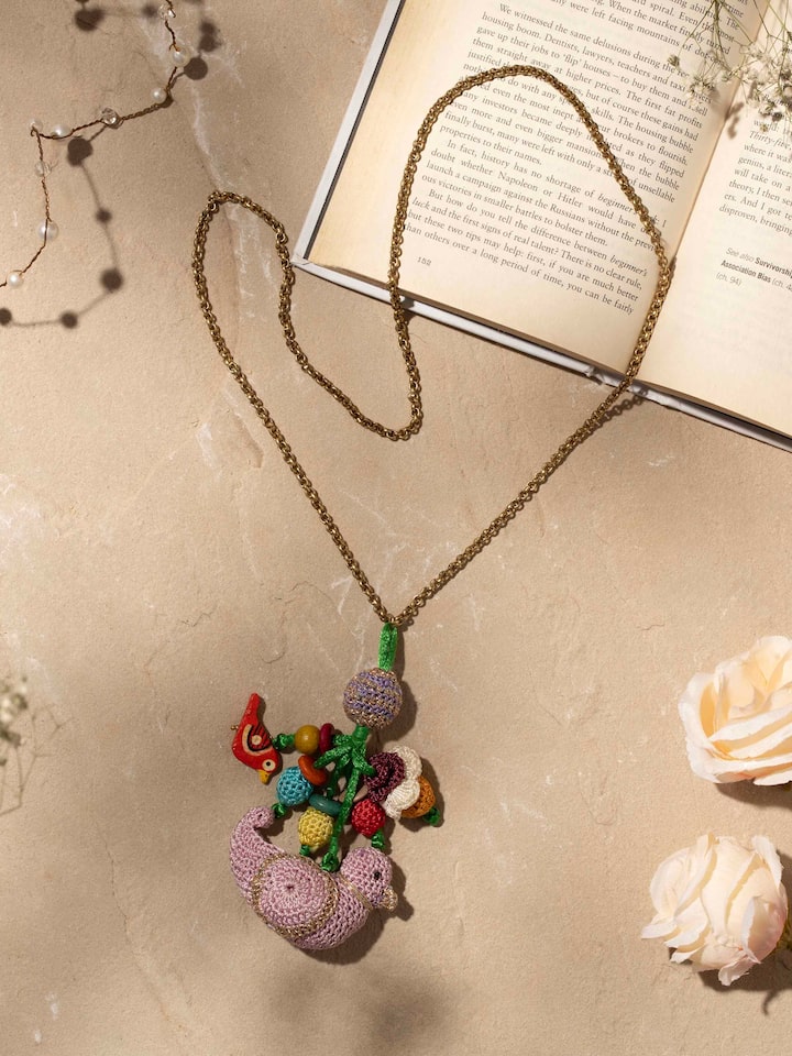 Side view of Crochet Pendant with Chain, highlighting craftsmanship