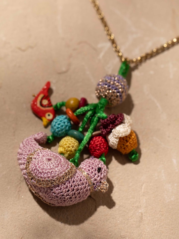Detailed view of Crochet Pendant with Chain, featuring craftsmanship