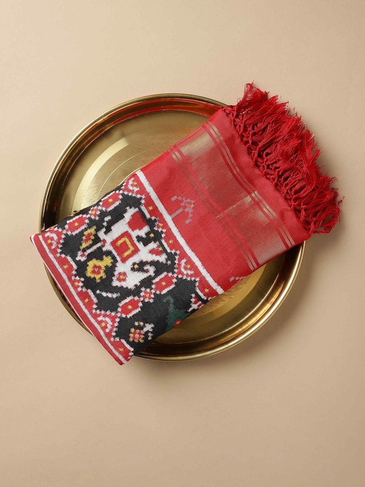 Close-up of Black Silk Patola Dupatta border and pattern details.