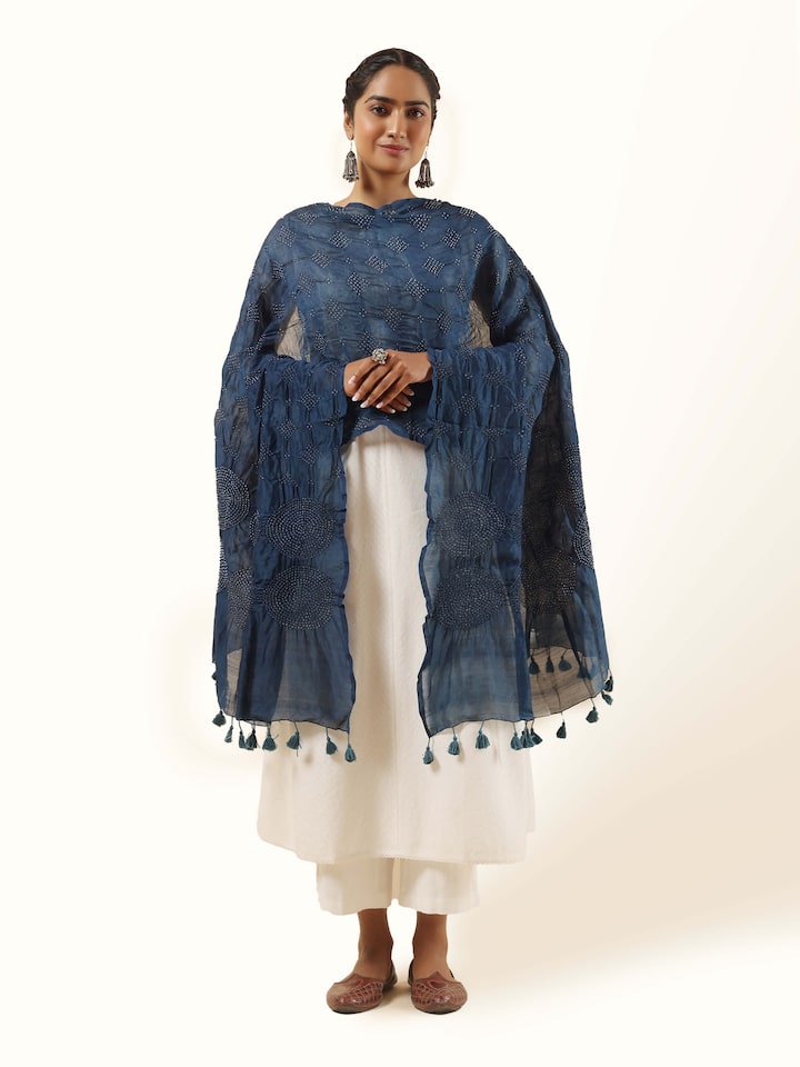 Indigo cotton Bandhani tie and dye dupatta displayed flat, featuring traditional dotted patterns and rich indigo color.