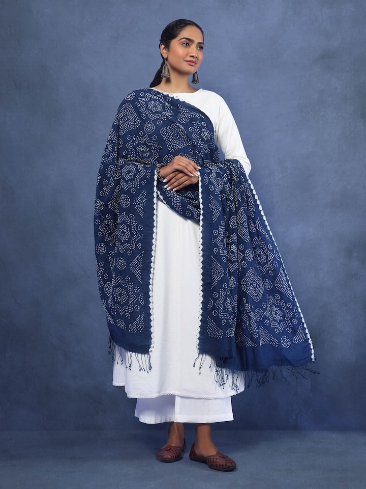 Lifestyle image of cotton Bandhani tie-dye dupatta draped elegantly with traditional attire