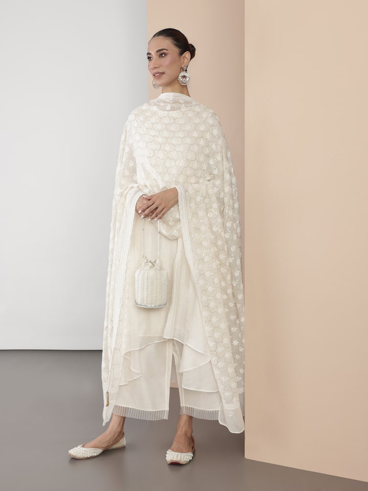 Side view of off-white cotton silk Mukaish embroidered dupatta with flowing drape