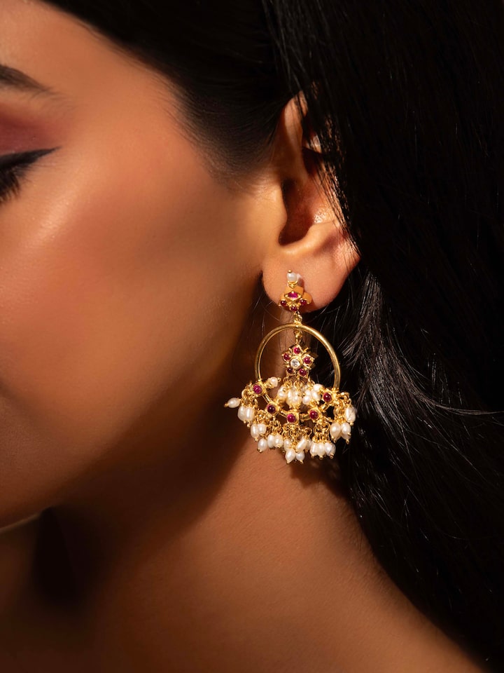 Alternate lifestyle view of Guttapusalu drop earrings styled with festive ensemble.
