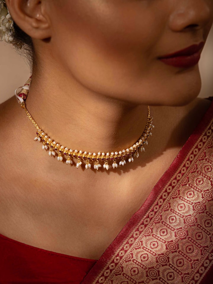 Styled view of Guttapusalu Silver Choker worn around the neck, showing how it looks styled