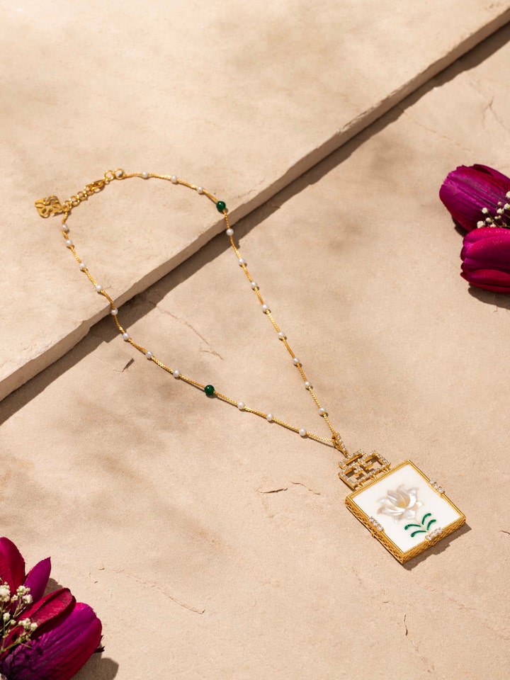 Close-up view of Pacchikari Silver Pendant and Chain displaying the intricate silver work and refined design.