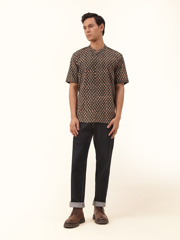 Front view highlighting the vibrant teal color and traditional hand block print of this pure cotton shirt.