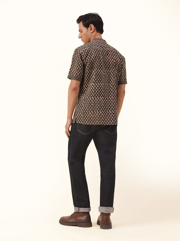 Back view presenting the understated charm and full view of this traditional yet modern shirt.