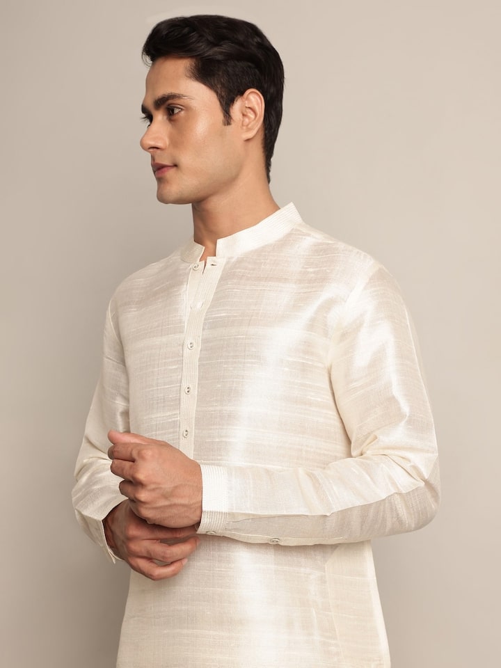Alternate lifestyle view of off-white silk long kurta showing fluid drape and soft sheen