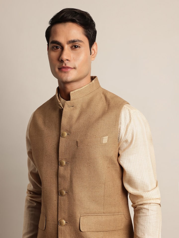 Third lifestyle shot with jacket styled over kurta for ethnic chic look