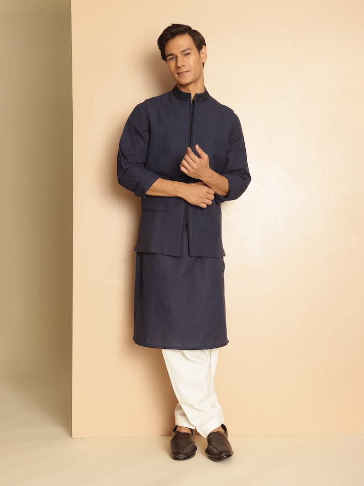 Navy blue cotton Soof embroidered sleeveless jacket lifestyle view styled over casual outfit