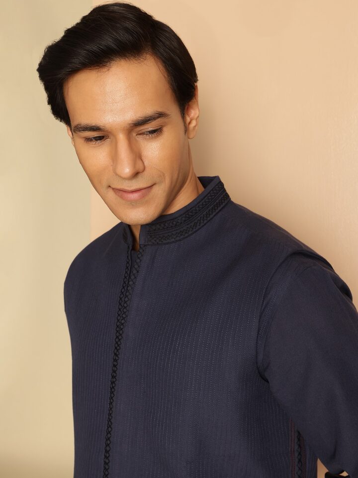 Navy blue cotton Soof embroidered sleeveless jacket close-up showing fine thread embroidery and texture