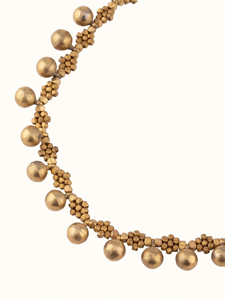 Back view of Dhokra Choker showing the secure clasp and smooth finish of the choker design.