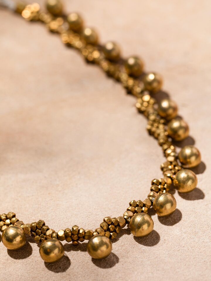 Overhead view of Dhokra Choker featuring the detailed Dhokra metalwork and elegant choker style.